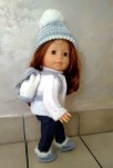 Ensemble pull, bonnet, bottillons et sac à dos